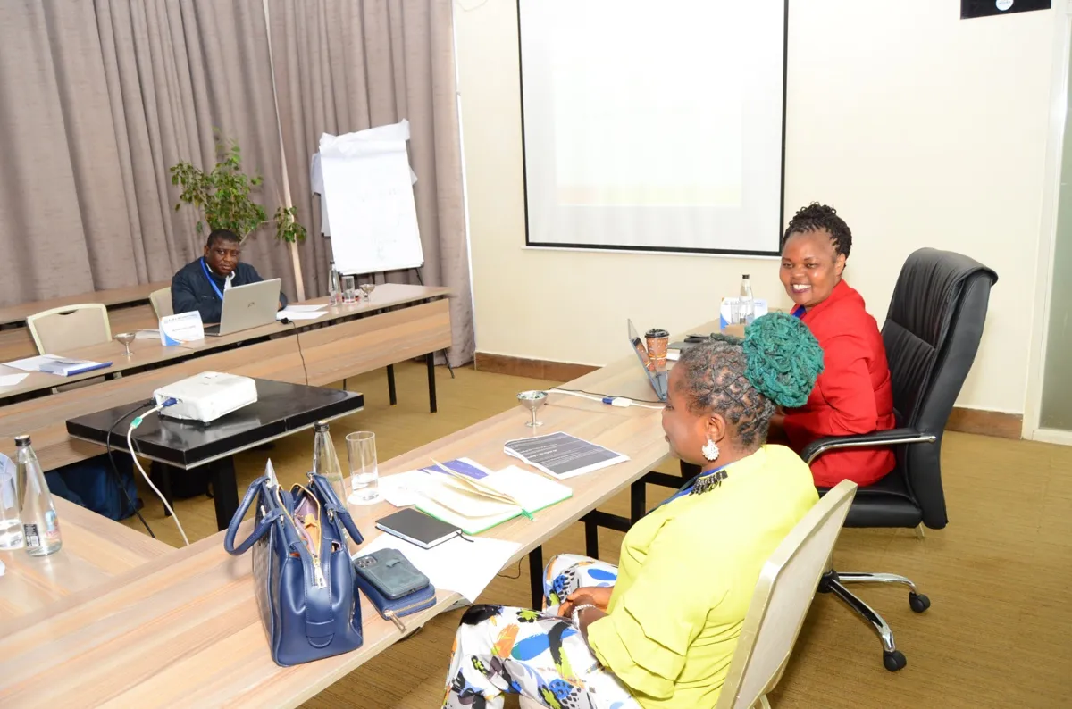 Facilitators and participants in a U-shaped AIBS training room